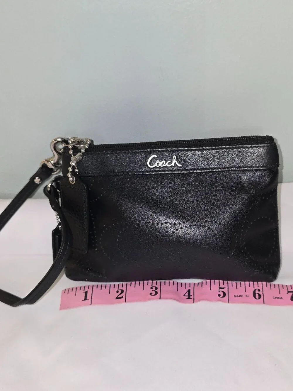 Coach signature perforated